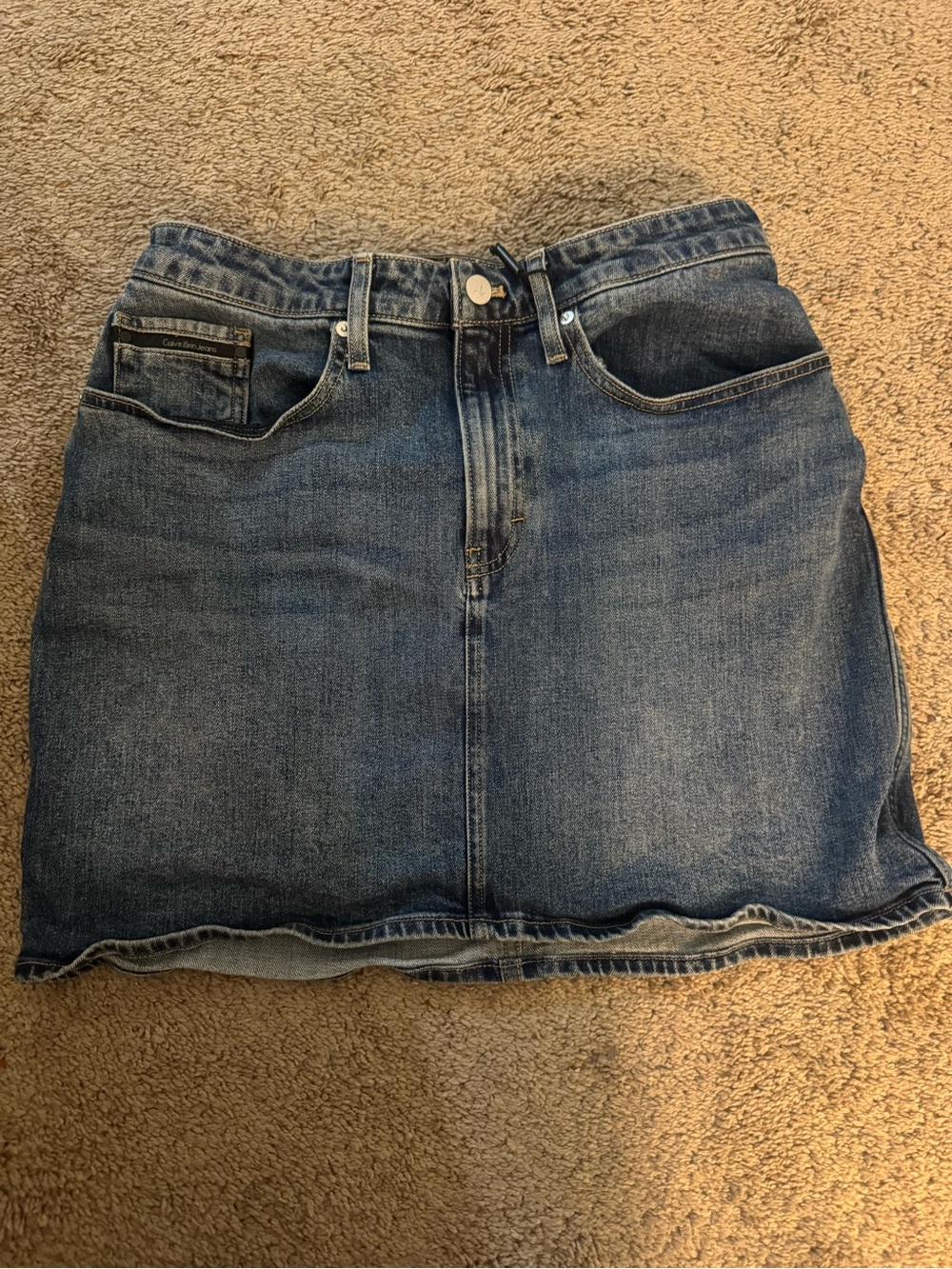 Calvin Klein medium blue denim mini skirt